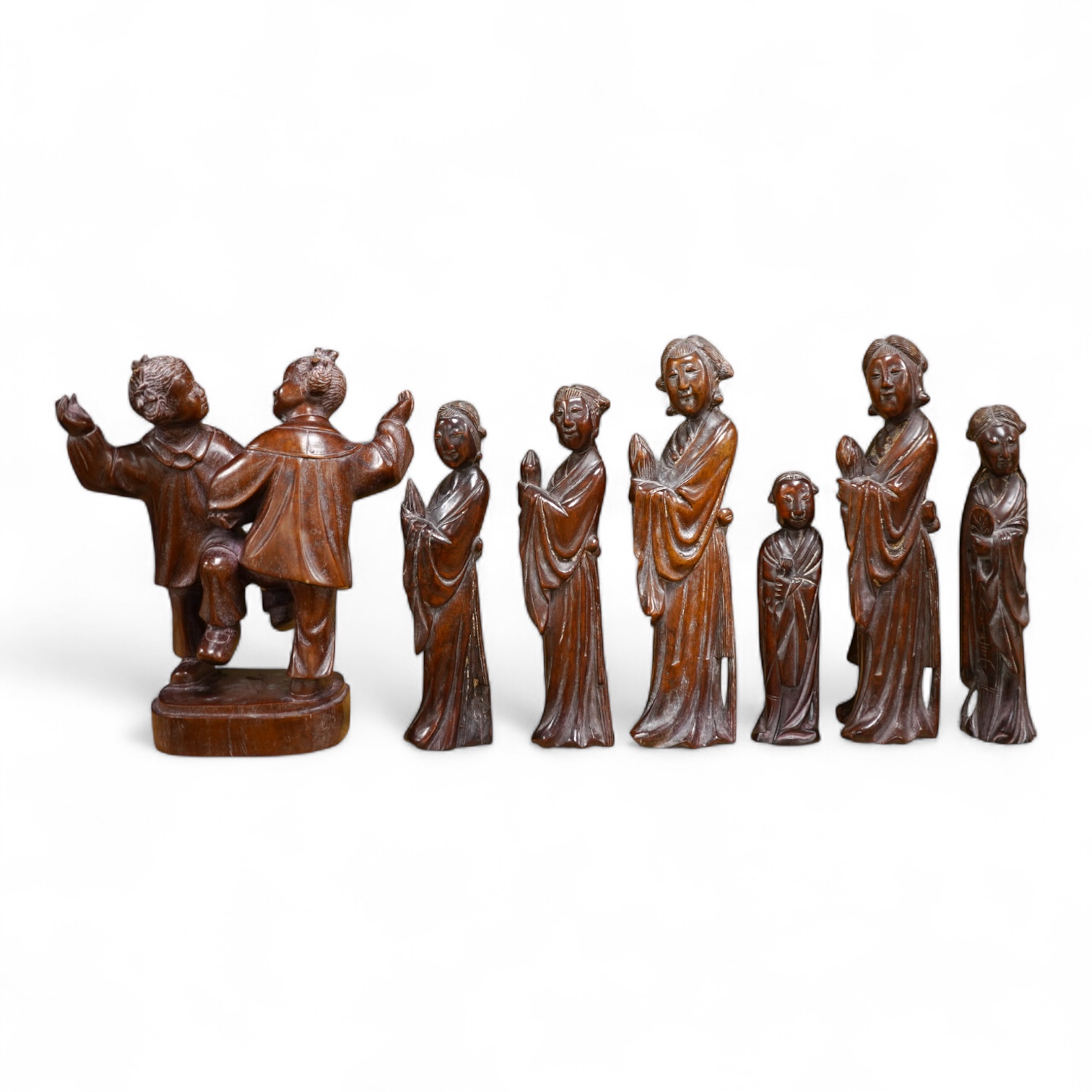 Six mid 20th century Chinese carved wood figures holding lotus and a Cultural Revolution carving of turin girls (7) tallest 21cm